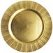 A close up of a gold Charge It by Jay round plastic charger plate with a geometric design.