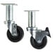 A pair of Pitco casters with black rubber wheels.