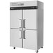 A stainless steel Turbo Air M3 Series reach-in freezer with black handles on wheels.
