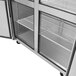 A Turbo Air M3 Series stainless steel reach-in freezer with two shelves.