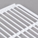 A white polyethylene-coated metal grid shelf.