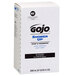 A white box with black and blue text reading "GOJO TDX Shower Up Soap & Shampoo"