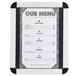 An Aarco satin aluminum snap frame with a black border holding a white menu.