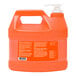 A plastic jug of GOJO Natural Orange Pumice Hand Cleaner with a white label and white cap.