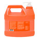 A plastic jug of GOJO Natural Orange Pumice Hand Cleaner with a white cap.