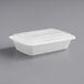 A white plastic Choice rectangular microwavable container with lid.