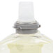 A plastic bottle of GOJO E2 foam hand soap with a grey plastic cap.
