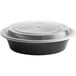 A black plastic Choice round container with a clear plastic lid.