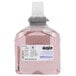 A white and pink bottle of GOJO premium foam hand soap with skin conditioners.