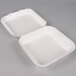 Two white Genpak medium foam containers with hinged lids.