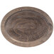 A wooden oval underliner with a walnut finish on a table.