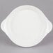 A CAC white stoneware round plate with handles.