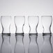 A row of four empty Libbey Mini Pub tasting glasses.