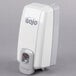 A GOJO® Dove Gray manual soap dispenser with a grey handle.