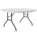 A gray granite Correll round folding table with black legs.