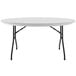 A gray granite Correll round folding table with a white surface.