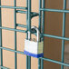 A padlock on a Regency green metal security cage door.