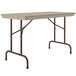 A mocha granite Correll rectangular folding table with metal legs.
