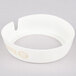 A white plastic Tablecraft salad dressing dispenser collar with beige lettering that says "Fat Free Ranch"