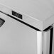 A Turbo Air Super Deluxe worktop refrigerator with stainless steel finish on a counter.