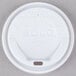 A Solo white foam cup lid with text on it.