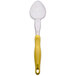 A Vollrath Jacob's Pride 14" Heavy-Duty Perforated Basting Spoon with a yellow Ergo Grip handle.
