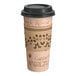 A Choice 20 oz. kraft paper hot cup with a lid on it.