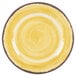 A yellow Carlisle melamine bread and butter plate with a swirly circle design.