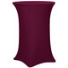 A burgundy Snap Drape Contour spandex table cover on a round bar height table.
