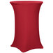 A crimson Snap Drape spandex table cover with a round top on a bar table.