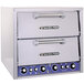 A white Bakers Pride countertop pizza oven with two drawers.
