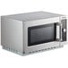 A silver Solwave commercial microwave with a black door.