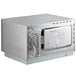 A silver Solwave commercial microwave oven with a door open.