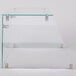A clear glass shelf with metal brackets on a white background.