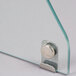 A close-up of a metal latch on a glass panel for an Excellence Curved Glass Sneeze Guard.