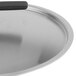 A Vollrath Wear-Ever aluminum pan cover with a Torogard handle on a counter.
