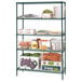 A green Metro wire shelving unit with food items on the shelves, including grapes, lettuce, and carrots.