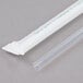 A clear plastic straw in a white paper wrapper with green Eco-Products writing.