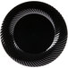 A black plastic plate with a wavy design.