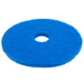 A blue Scrubble 53-17 floor pad for cleaning floors.