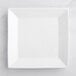 An Acopa bright white square porcelain plate on a white surface