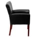 A Flash Furniture black leather executive chair with mahogany legs.