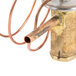 A close-up of a Hoshizaki copper expansion valve tube.