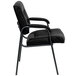 A Flash Furniture black leather executive side chair with a metal frame.