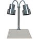 A Hanson Heat Lamps chrome carving station with white synthetic granite base and two lamps.