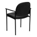 A Flash Furniture black vinyl stackable side chair with metal legs.