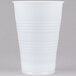 A Dart translucent plastic cup with a red lid.