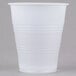 A Dart Y7 Conex white plastic cup with a lid.