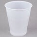 A Dart translucent plastic cup on a white surface.