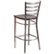 A Flash Furniture metal restaurant barstool with a walnut wood seat and ladder back.